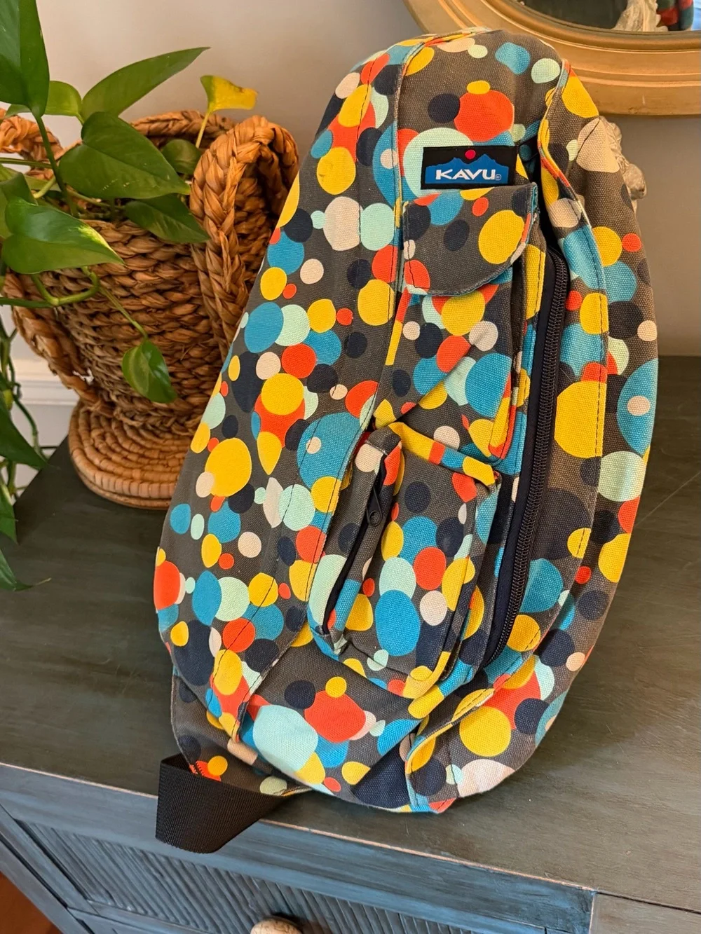 Kavu Rope sling back pack multi colored All zippers work. No pets owner